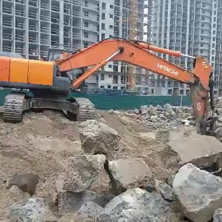 Excavator on demolition work