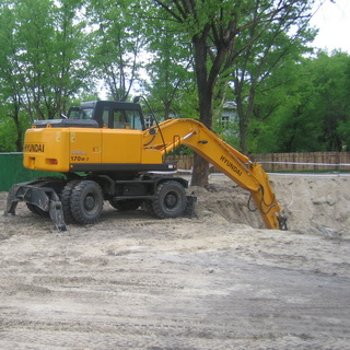 Digging of one of 15 ditches at construction of the residential district Sotsgorod