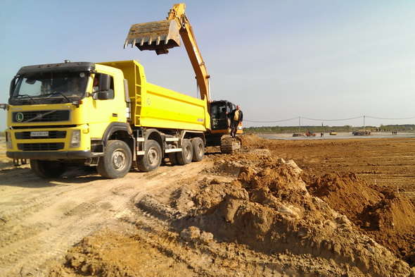 Earthworks with the special technics in the construction of a wood processing plant in Korosten